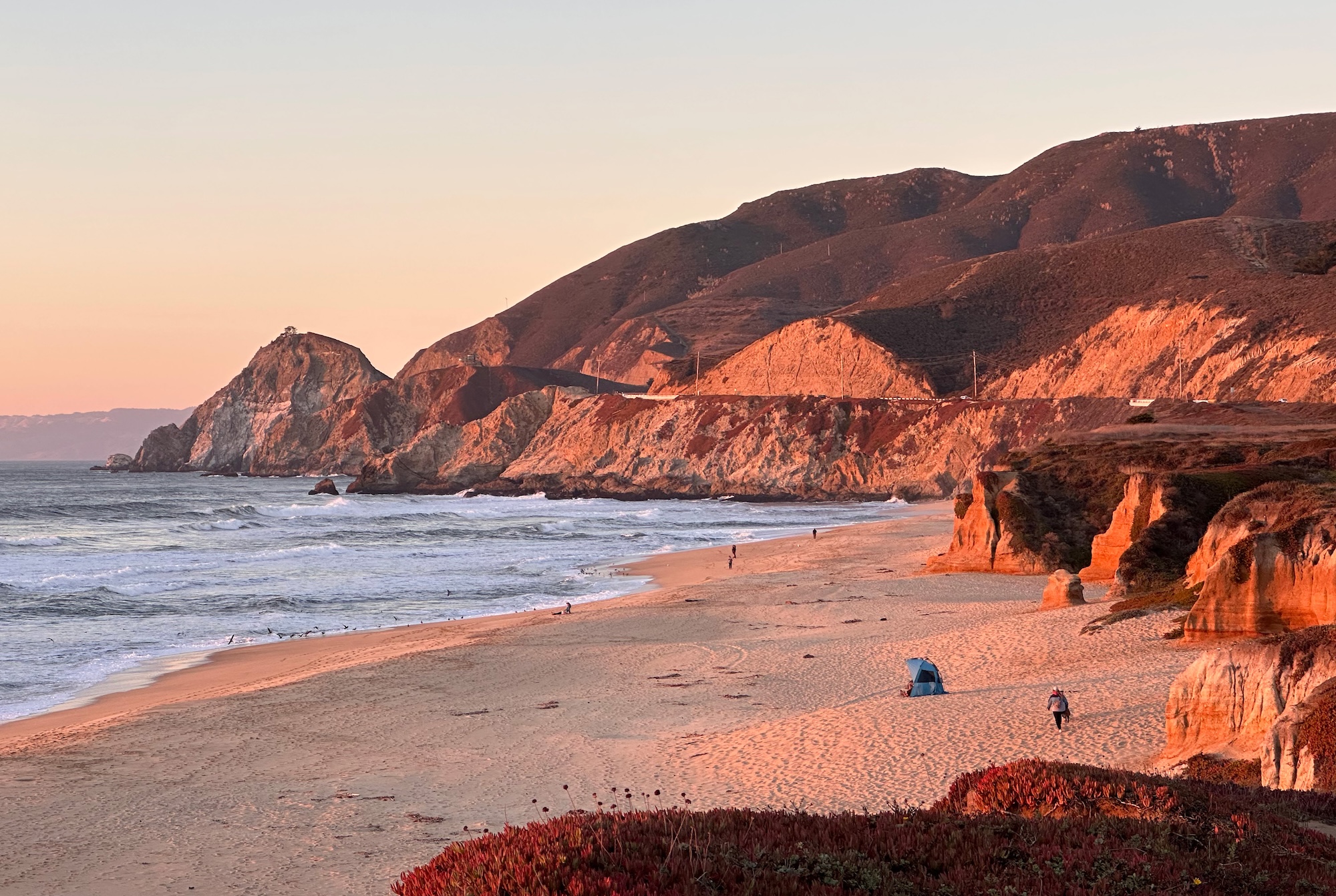 Sunset on a beach in Moss Beach California. Our commitment to social impact post-election is unwavering. We’re here to support justice and stand up for those marginalized, no matter the challenges ahead.